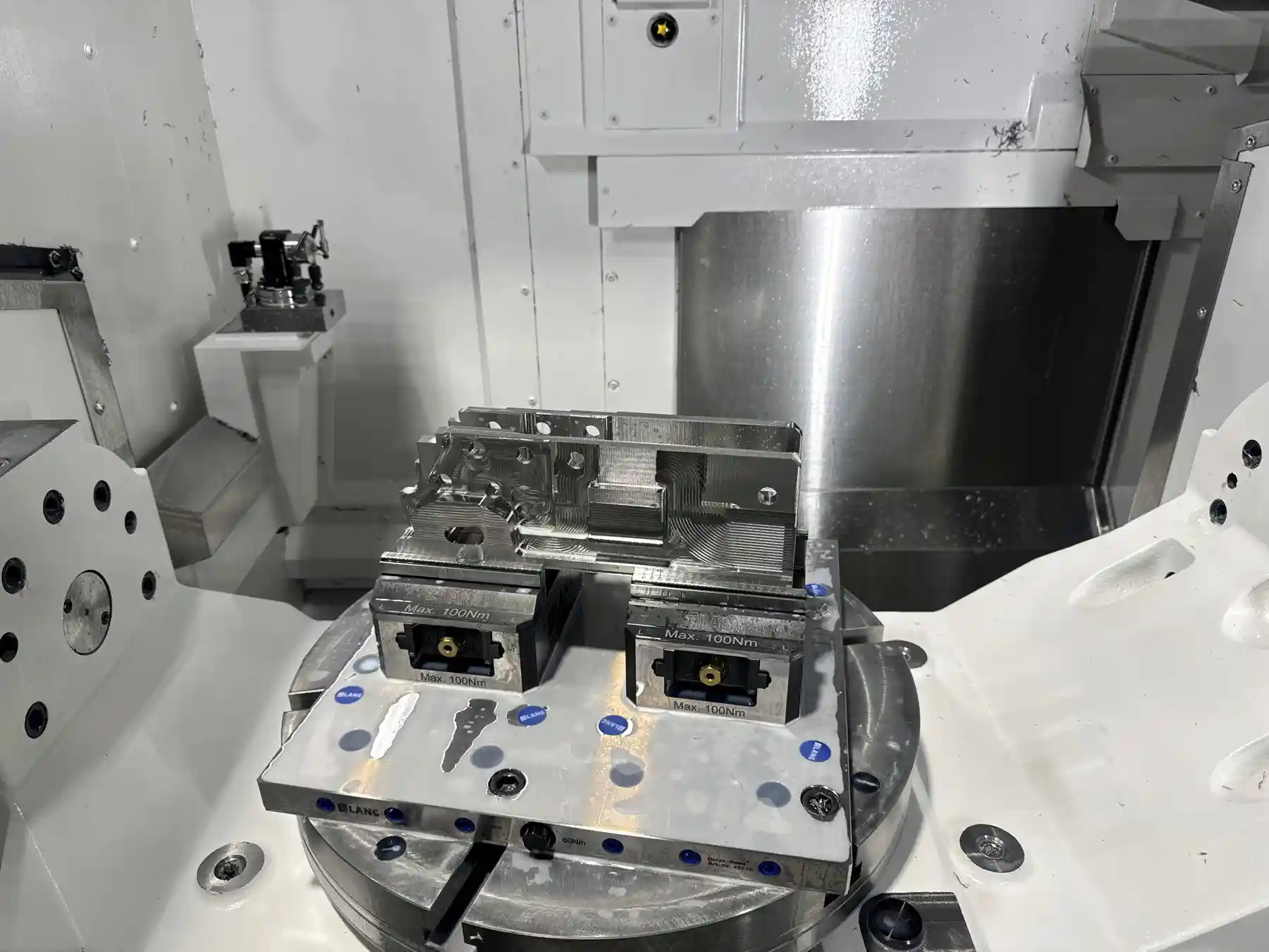 5-axis trunnion with zero-point workholding vises mounted