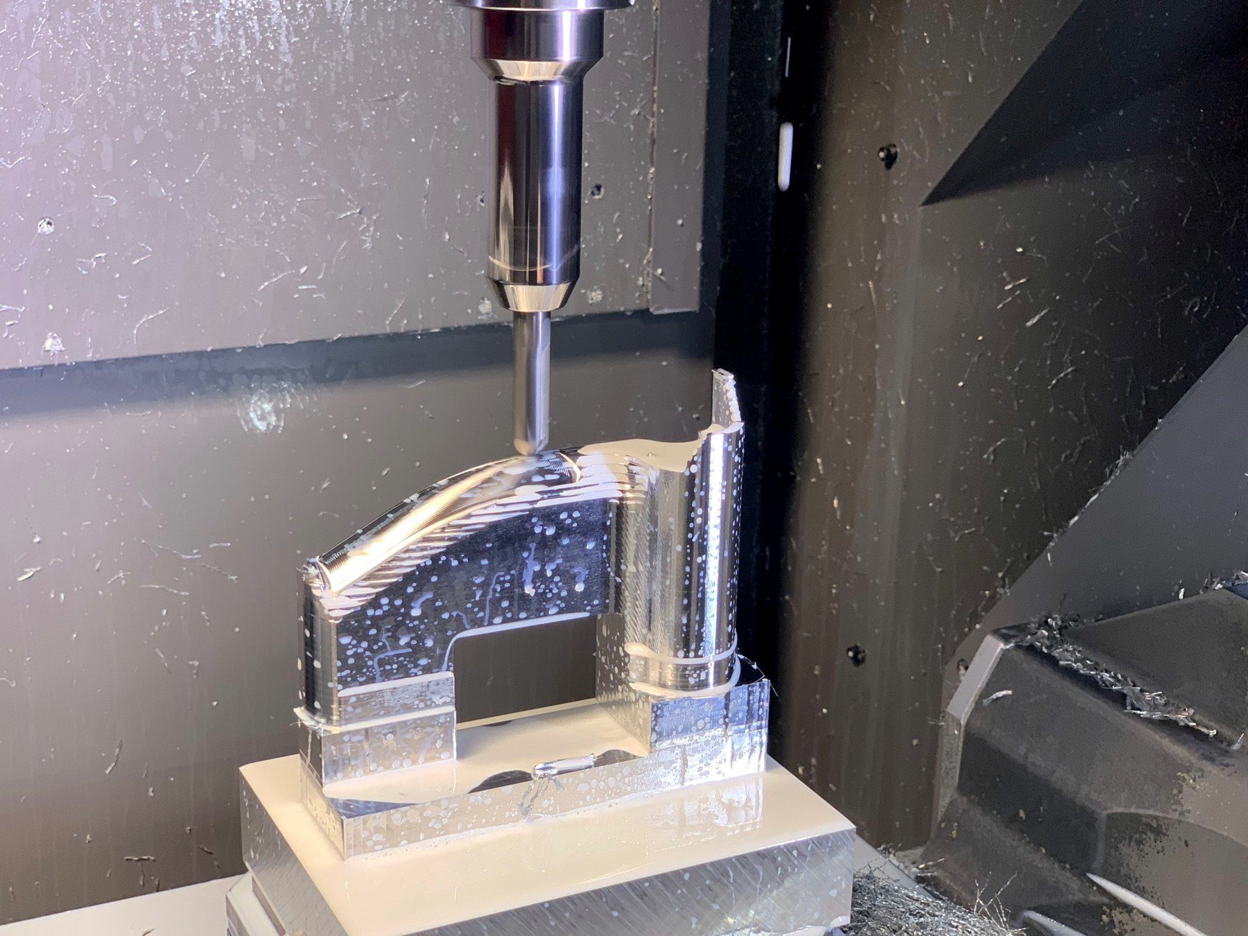 Tapping and drilling operations running on a fixtured part