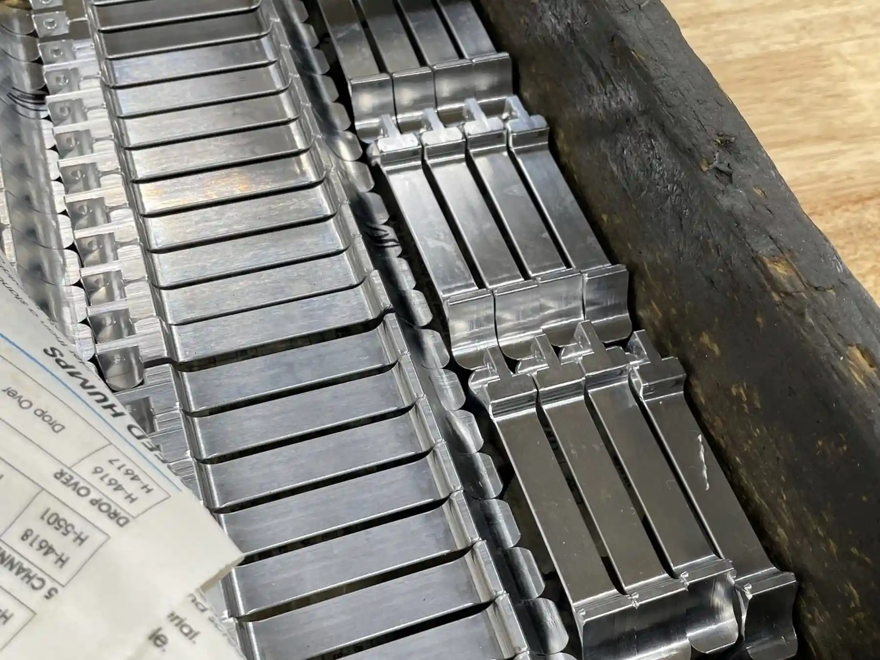 Turned bar components staged for secondary operations